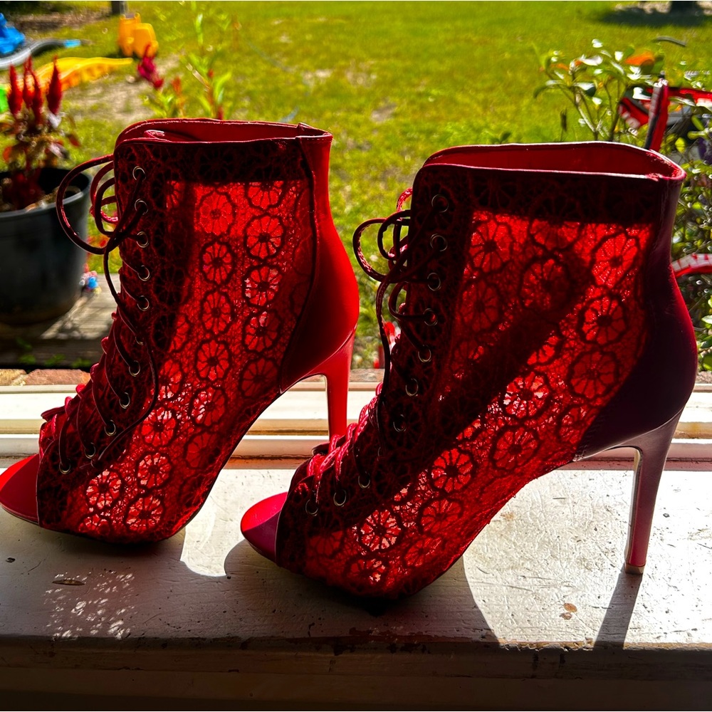 Red lace 5-6 inch heels. unsure of the price bc they were given to me.
